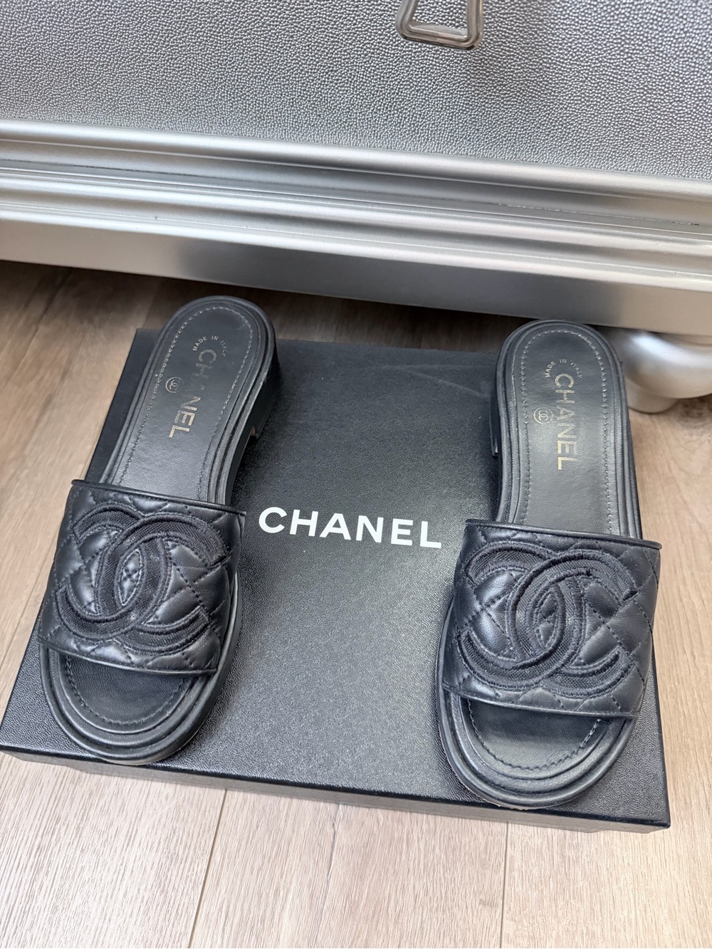 CHANEL Black Quilted Leather Slide Mules with CC Motif